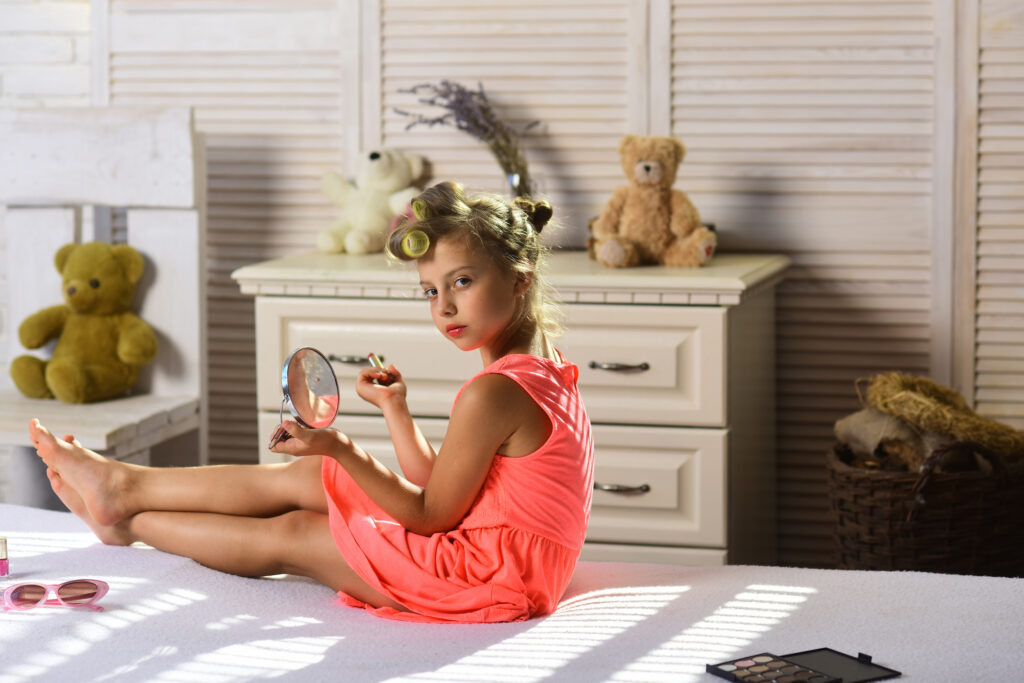 Young girl wearing make up. School picture day tips.
