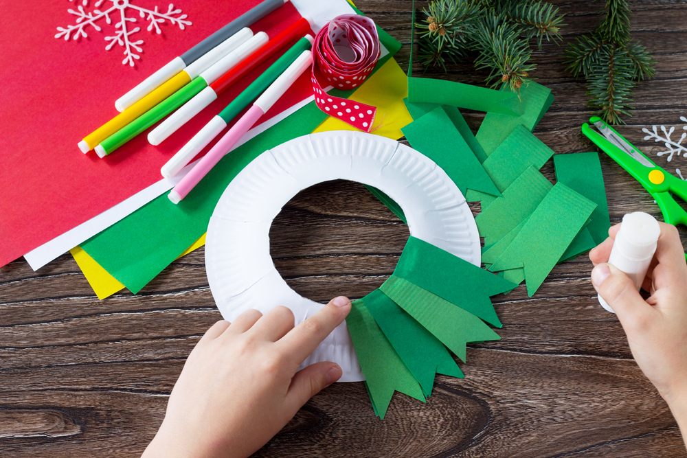 Making Christmas wreaths from paper plates is the perfect Christmas craft! Here are some fun and simple Christmas paper plate crafts for kids {of all ages!}.