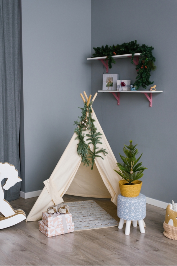 If you're looking for easy holiday decor for kids rooms, why not keep in simple by adding some garland around the room? They will love it! 